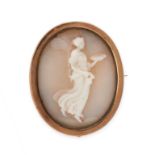 AN ANTIQUE SHELL CAMEO BROOCH in yellow gold, the oval body set with a shell cameo carved to