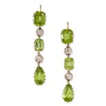 A PAIR OF PERIDOT AND DIAMOND EARRINGS each set with a trio of emerald cut and pear cut peridot,