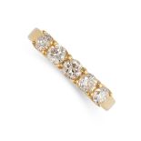 A DIAMOND SEVEN STONE RING in 18ct yellow gold, the band set with seven round cut diamonds, the