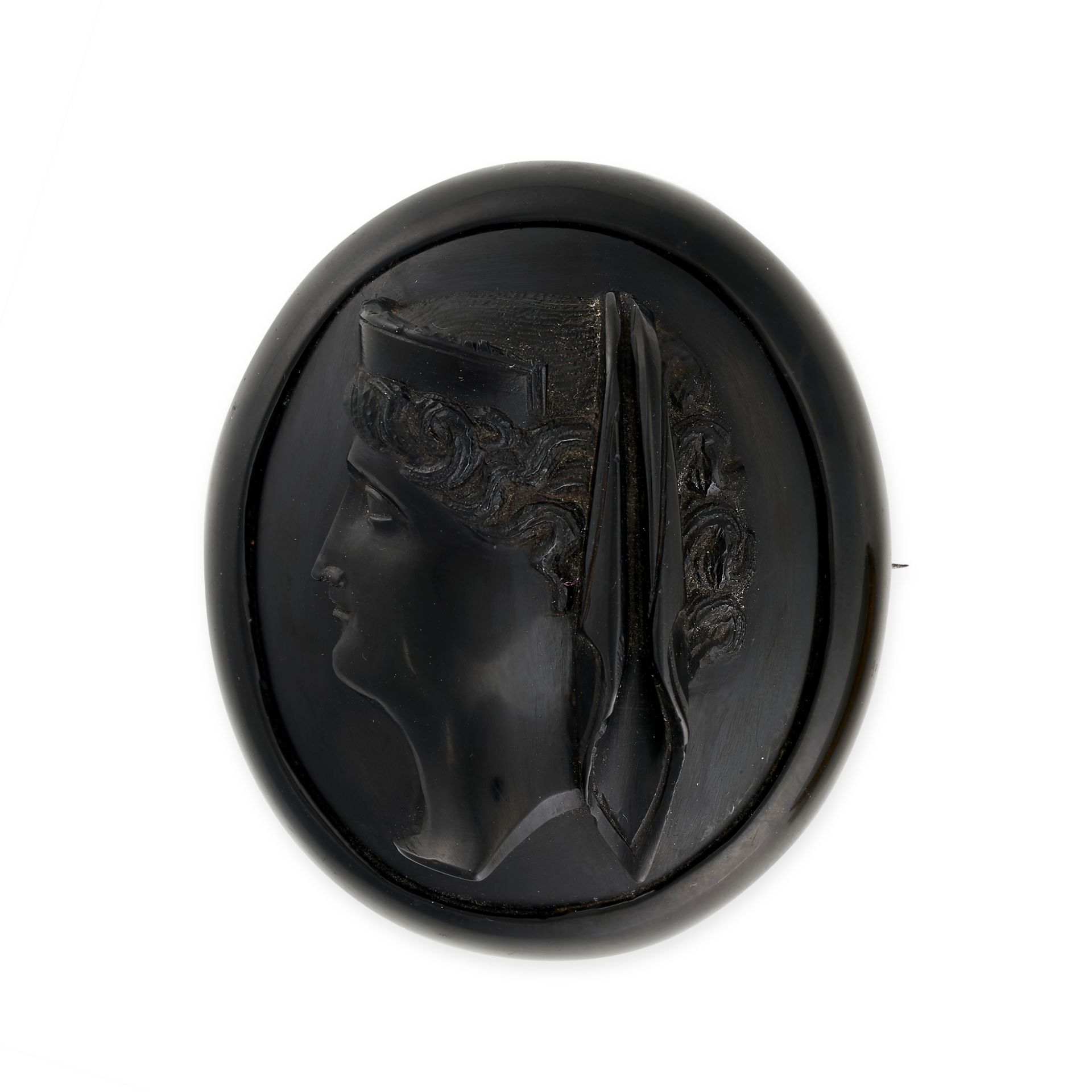 AN ANTIQUE JET CAMEO BROOCH the oval body formed from a single piece of jet, carved in detail to