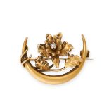 AN ANTIQUE DIAMOND CRESCENT MOON BROOCH in yellow gold, designed as a crescent moon with a flower at