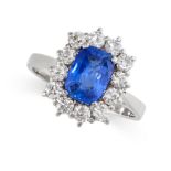 A SAPPHIRE AND DIAMOND CLUSTER RING  Cushion cut blue sapphire, approximately 2.00 carats  Round