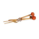 AN ANTIQUE CORAL AND DIAMOND BROOCH in 18ct yellow gold, set with two coral beads accented by rose