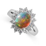 AN OPAL AND DIAMOND RING set with an oval cabochon opal in a cluster of brilliant cut diamonds,