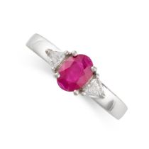 A RUBY AND DIAMOND THREE STONE RING in 18ct white gold, set with an oval cut ruby of approximately