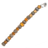 AN ANTIQUE CITRINE SWEETHEART BRACELET in silver, formed of a series of links set with oval cut
