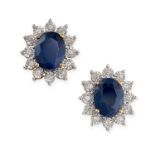 A PAIR OF SAPPHIRE AND DIAMOND STUD EARRINGS set with oval cut sapphires, both totalling 3.85