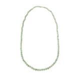 A VINTAGE JADEITE JADE BEAD NECKLACE in 9ct yellow gold, comprising a single row of ninety-seven