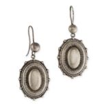 A PAIR OF ANTIQUE REVIVALIST EARRINGS in silver, in the Etruscan revival manner, the oval bodies
