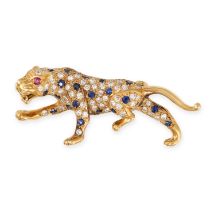 A SAPPHIRE, DIAMOND AND RUBY PANTHER BROOCH in 18ct yellow gold, set with round cut sapphires,
