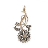 AN ANTIQUE DIAMOND FLOWER PENDANT in yellow gold and silver, designed as a flower, with foliate