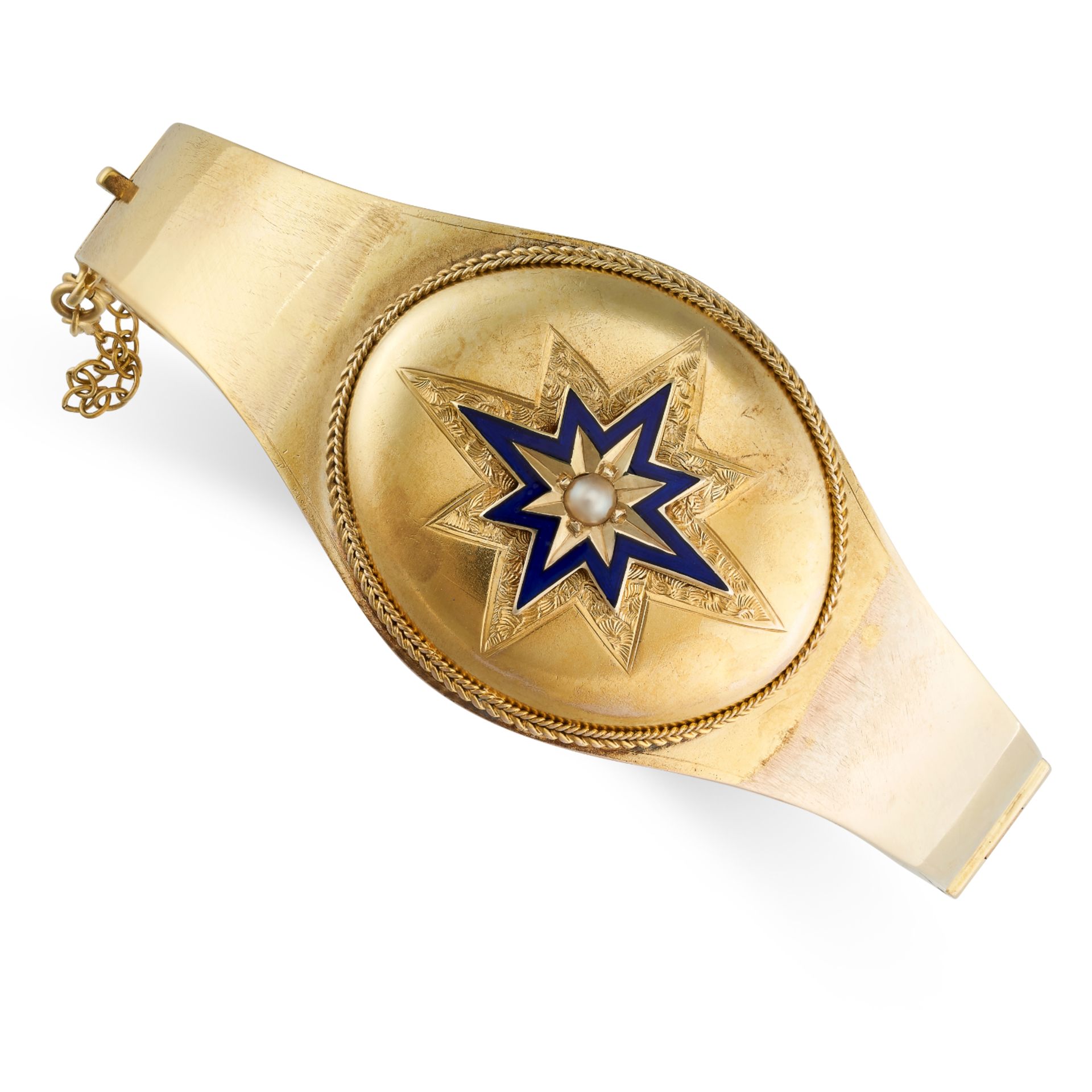 AN ANTIQUE PEARL AND ENAMEL BANGLE, LATE 19TH CENTURY in high carat yellow gold, the tapering hinged