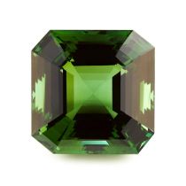 AN EXCEPTIONAL UNMOUNTED GREEN TOURMALINE of cut cornered step cut, weighing 73.90 carats, 24.4mm
