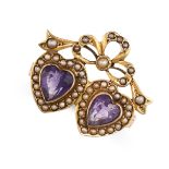 AN ANTIQUE AMETHYST AND PEARL SWEETHEART RING in 15ct yellow gold, designed to depict two twin