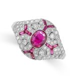 A RUBY AND DIAMOND DRESS RING the tapering face set with a central oval cut ruby, accented by single