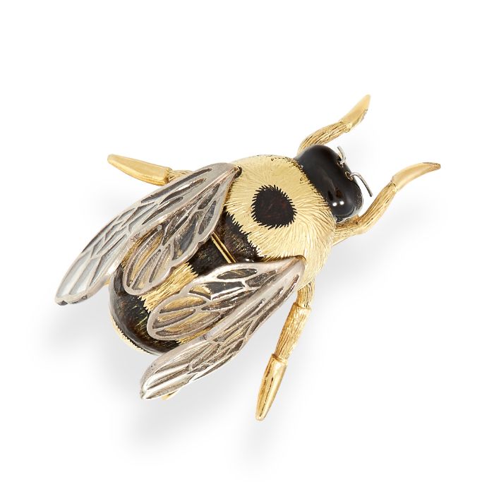 AN ENAMEL EN TREMBLANT BEE BROOCH in high carat yellow gold, designed as a bee, with trembler