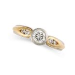 A SOLITAIRE DIAMOND DRESS RING in platinum and 18ct yellow gold, set with a round brilliant cut