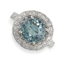 AN AQUAMARINE AND DIAMOND RING in platinum, set with a round cut aquamarine of 4.05 carats in a