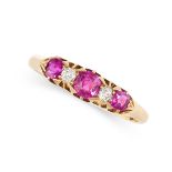 AN ANTIQUE BURMESE RUBY AND DIAMOND RING in 18ct yellow gold, set with a trio of graduated cushion