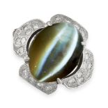 A CAT'S EYE CHRYSOBERYL AND DIAMOND RING set with a cabochon cat's eye chrysoberyl of 12.50 carats