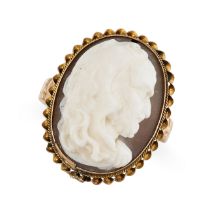 AN ANTIQUE SHELL CAMEO DRESS RING in yellow gold, set with an oval cameo carved in detail to