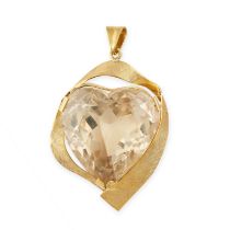 A VINTAGE CITRINE HEART PENDANT in 18ct yellow gold, set with a heart shaped mixed cut citrine,