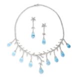A BLUE TOPAZ AND DIAMOND DEMI-PARURE comprising a necklace and a pair of earrings, formed of foliate