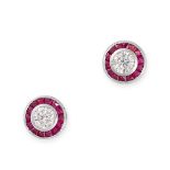 A PAIR OF RUBY AND DIAMOND TARGET EARRINGS each set with a round cut diamond within a halo of French