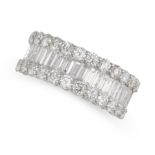 A DIAMOND ETERNITY RING set with a row of baguette cut diamonds between two rows of round cut