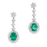 A PAIR EMERALD AND DIAMOND DROP EARRINGS each set with an oval cut emerald in a cluster of round cut