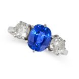 A CEYLON NO HEAT SAPPHIRE AND DIAMOND THREE STONE RING set with a cushion cut sapphire of 2.30