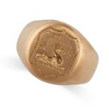A SIGNET RING the oval face with a reverse carved heraldic crest and motto, no assay marks, size Q /