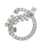 A VINTAGE DIAMOND BROOCH designed as a wreath, set with brilliant and baguette cut diamonds all