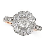 A DIAMOND CLUSTER RING set with an old cut diamond of 0.68 carats in a cluster of old cut