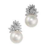 A PAIR OF PEARL AND DIAMOND EARRINGS each set with a South Sea pearl of 14.3mm, below a cluster of