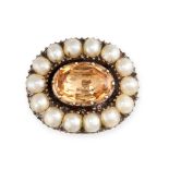 AN ANTIQUE GEORGIAN IMPERIAL TOPAZ AND PEARL BROOCH set with an oval cut imperial topaz in a cluster