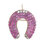 A BURMA NO HEAT PINK SAPPHIRE AND DIAMOND HORSESHOE BROOCH / PENDANT in yellow gold and silver,