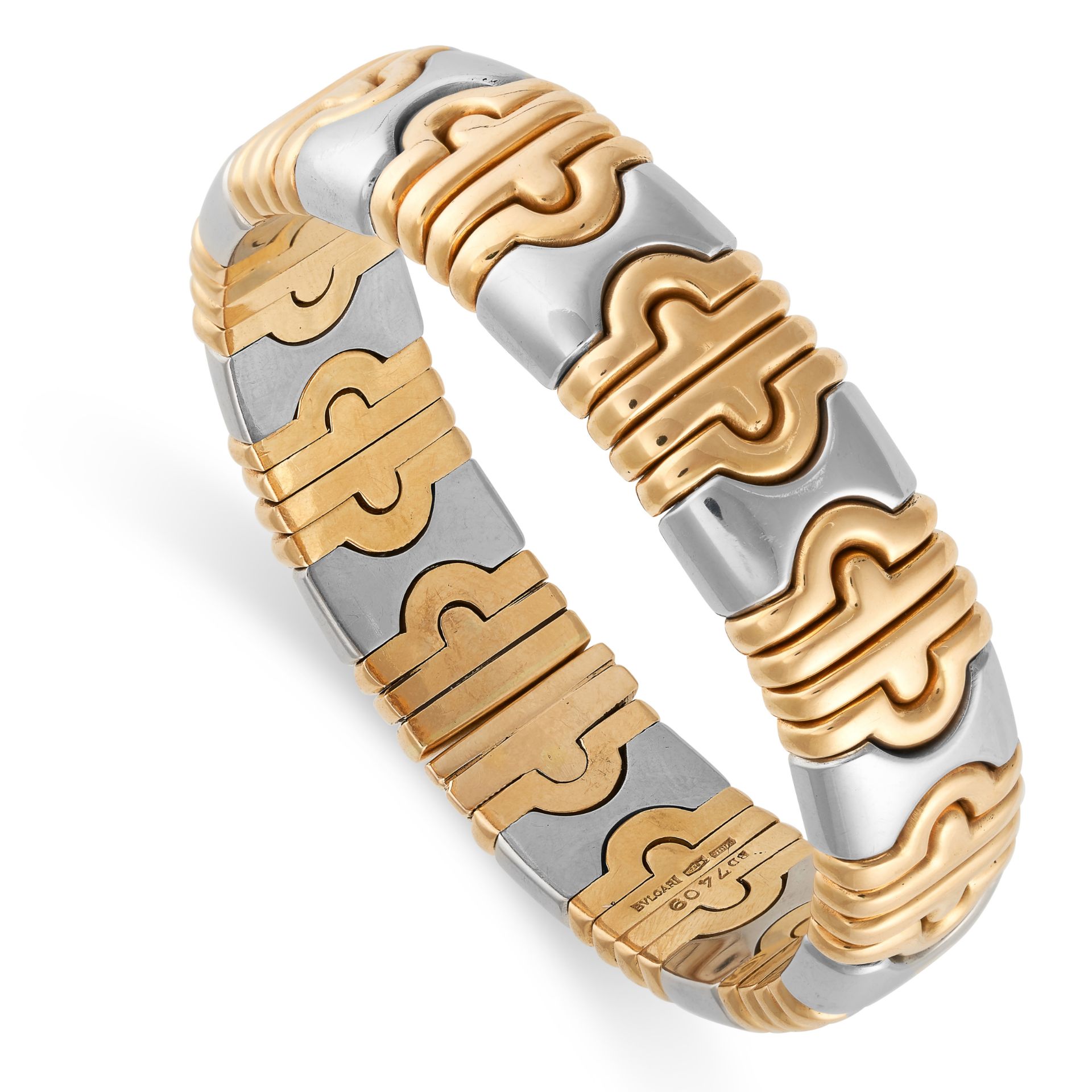 BULGARI, A PARENTESI CUFF BRACELET in 18ct yellow gold and stainless steel, in two tone design,