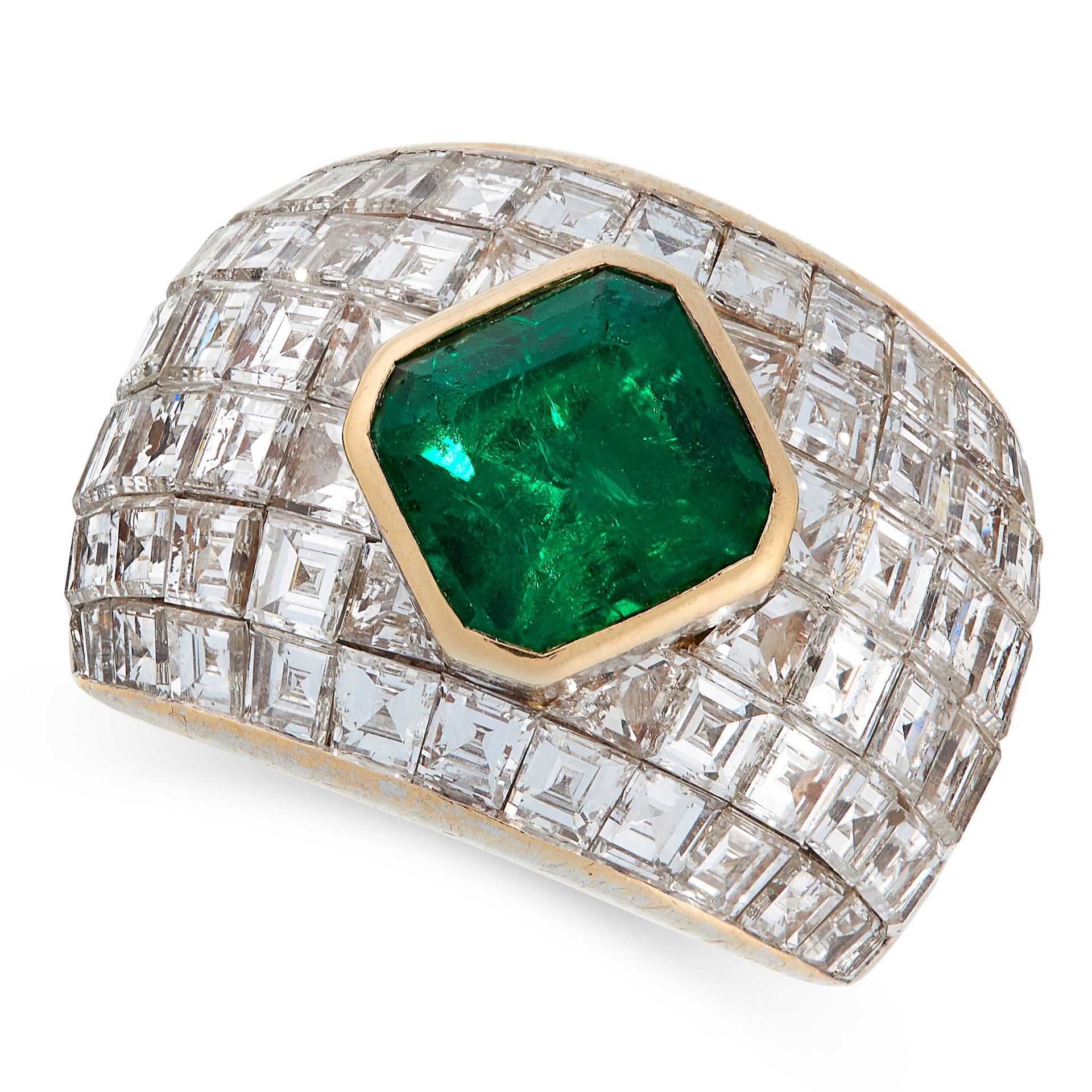 AN EMERALD AND DIAMOND RING in 18ct white gold, of bombe design, set with an octagonal cut emerald