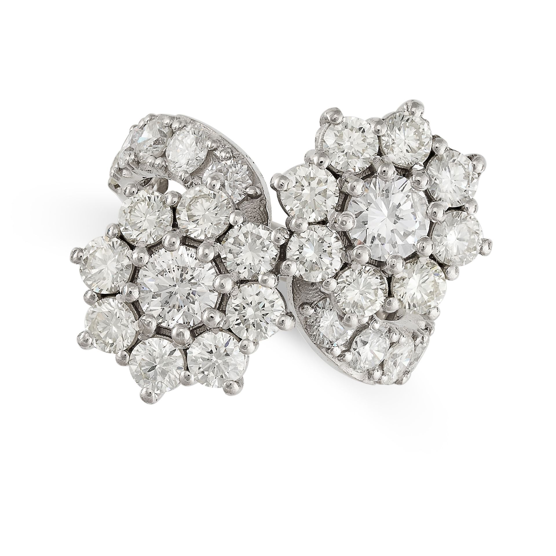 A DIAMOND CLUSTER TOI ET MOI RING the stylised band with two clusters of round brilliant cut