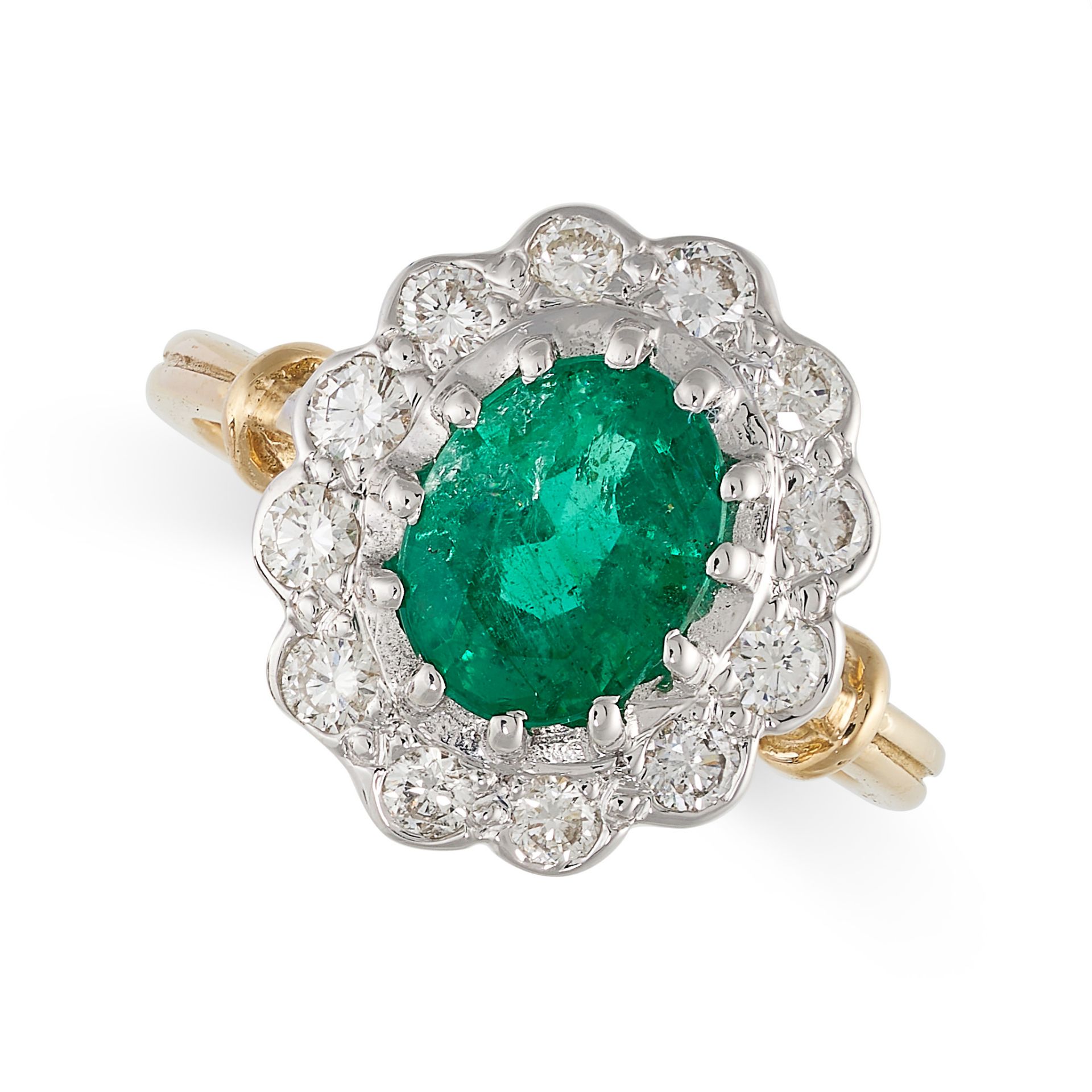 AN EMERALD AND DIAMOND CLUSTER RING in 18ct yellow gold, set with an oval cut emerald in a cluster