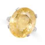 A CEYLON NO HEAT YELLOW SAPPHIRE AND DIAMOND RING set with an oval mixed cut yellow sapphire of 27.