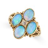 AN OPAL AND DIAMOND RING in 18ct yellow gold, set with a round cut diamond within a cluster of