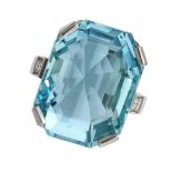 AN AQUAMARINE AND DIAMOND RING in 18ct white gold, set with an emerald cut aquamarine of 6.26