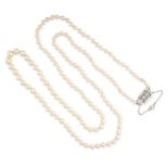 A PEARL AND DIAMOND NECKLACE comprising a single row of pearls ranging from 4.2mm to 8mm, the