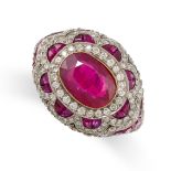 A FINE ART DECO RUBY AND DIAMOND RING in platinum, set with an oval cut ruby of 2.66 carats in a