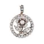 AN ANTIQUE DIAMOND FLOWER PENDANT in yellow gold and silver, set with a circular border of old cut