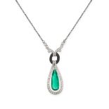 A FINE EMERALD, DIAMOND AND ONYX PENDANT NECKLACE set with a pear cut emerald of 1.42 carats,