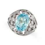 A BLUE ZIRCON AND DIAMOND DRESS RING set with an oval cut blue zircon of 5.76 carats, within an