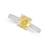 A FANCY INTENSE YELLOW DIAMOND ENGAGEMENT RING set with a yellow radiant cut diamond of 1.53 carats,